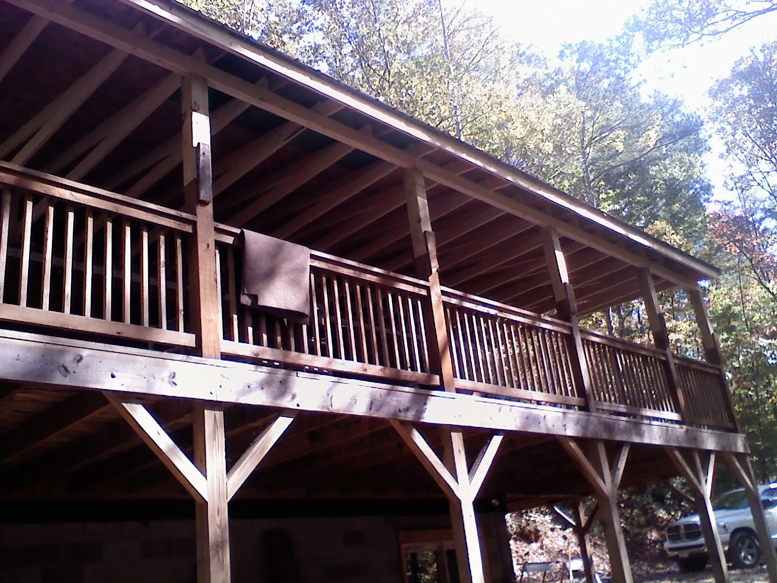 Timber framing under a new elevated porch and deck — Roof Leak Repair in Rowlesburg by Roofing Brothers
